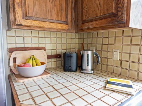 In addition to the toaster and electric kettle, you'll also find a Cuisinart coffee maker, coffee grinder, French press, tea infusers, NutriBullet blender, non-stick and stainless steel cookware, Weck jars,   Stasher storage bags and organic spices.