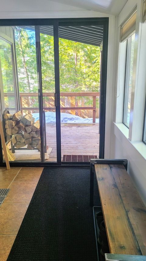 Firewood is available right outside your door, which leads to the back deck and fenced yard.