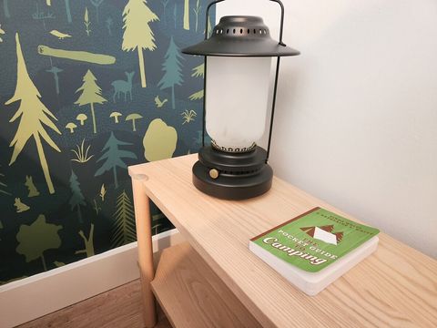 There's ample room for bedside tables and reading material on either side of the king bed. 