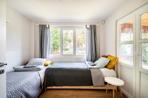 Second bedroom with 2 single bed, gives privacy for friends and family