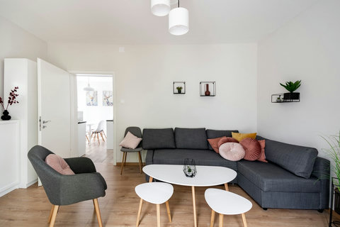Spacious living room with a sofa bed