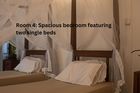 Bedroom 4 with two single beds