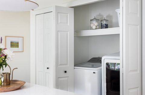 Large capacity washer and dryer available for guest use in kitchen