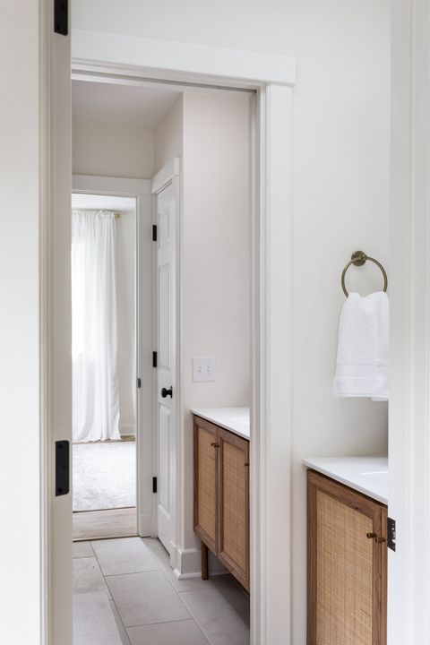 Main floor bathroom with jack and jill sinks between the kitchen and master bedroom
