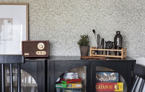 Lots of games and puzzle available to play in the dining room as well as a radio and full bar set