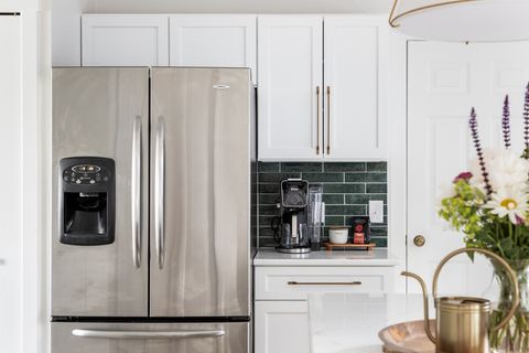 Coffee station has a ninja coffee pot and keurig combo. Sugar and cream is also stocked