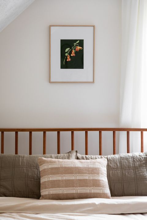 Local artists are featured all over the house, including the upstairs bedroom