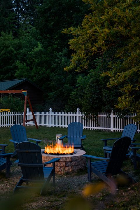 The backyard is fully fenced and great for nighttime entertainment