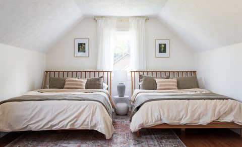 Second upstairs bedroom with 2 queen sized beds