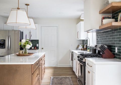 Kitchen is fully equipped with fridge, dishwasher, stove, oven, and microwave