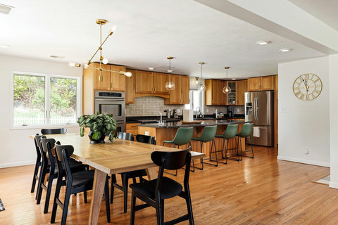 Bright open kitchen with island seating and spacious dining area