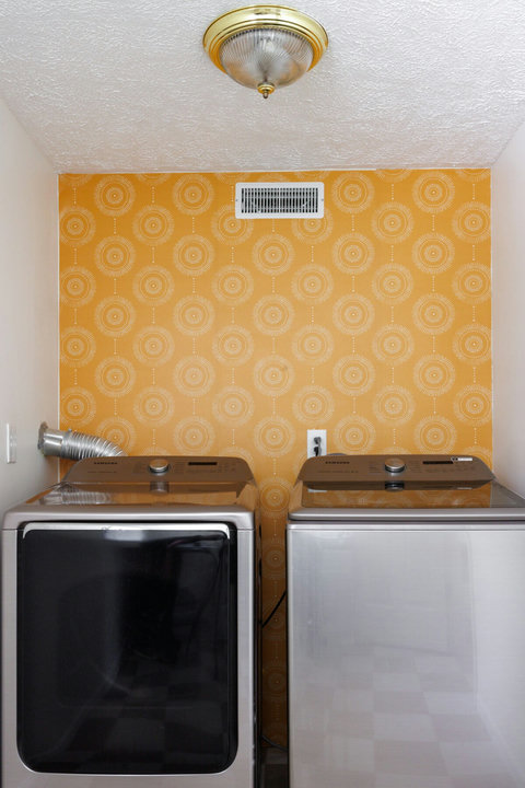 In-unit washer and dryer with cheerful retro-style laundry room