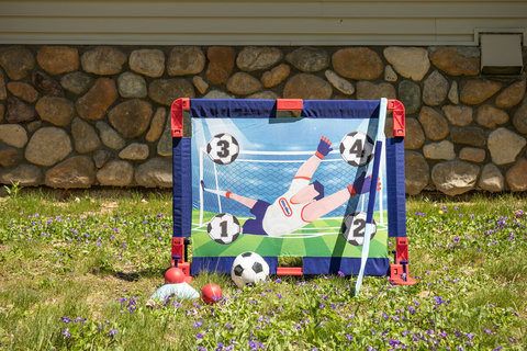Family-friendly backyard soccer game for outdoor fun