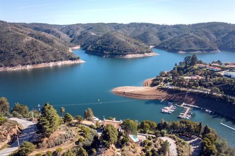 Aerial view of the house, marina and lake