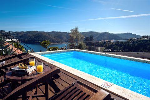 Unwind on the pool with stunning lake views
