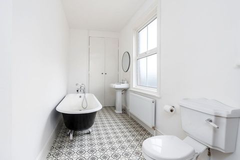 Bathroom with cast iron bath