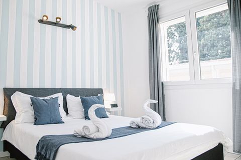 Welcome to our spacious and elegantly furnished master bedroom, where you can truly relax and unwind. Notice how we’ve crafted swan shapes for our guests? It’s just one of the many ways we strive to make your stay special.