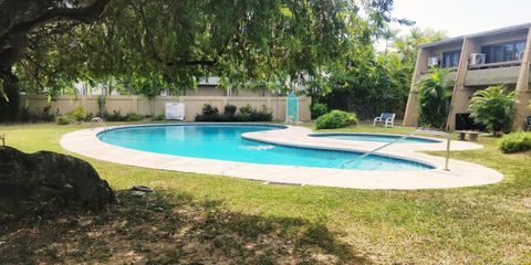 Pool with garden views