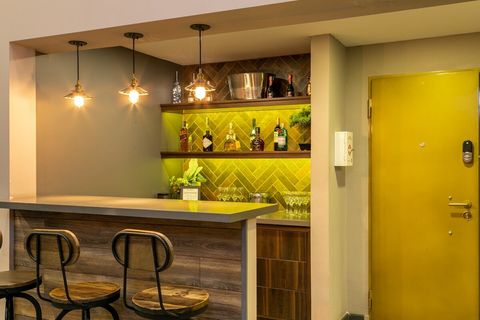 [The Gentlemen's Bar] Enter the golden door and get to fun. Jacuzzi to your right.