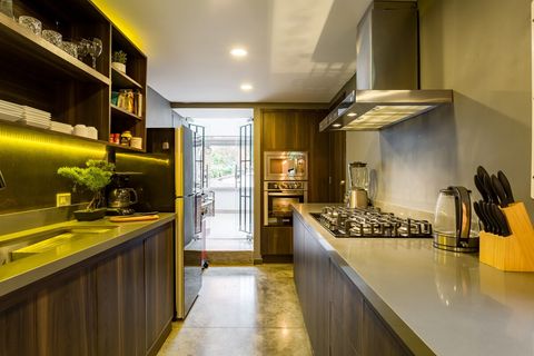 [KITCHEN] This is your fully-stocked kitchen for the weekend. Enjoy the snacks, the teas and coffees, sharp knives, dozens of fine spices