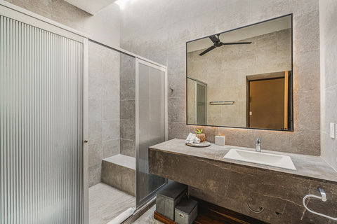 One of Our 3.5 Bathrooms with Rain Shower, Shampoo, Conditioner, Shower Gel, Towels and Hair Dryer