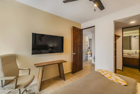 Smart TVs in all bedrooms, Work Desk and Ergonomic Chair in this Bedroom