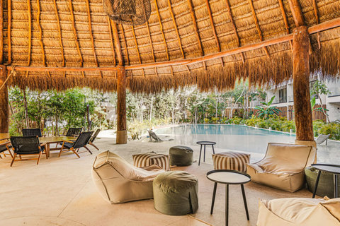 Relax in our palapa downstairs equipped with Hammocks, lounge Chairs and bean bags for maximum relaxation and comfort.