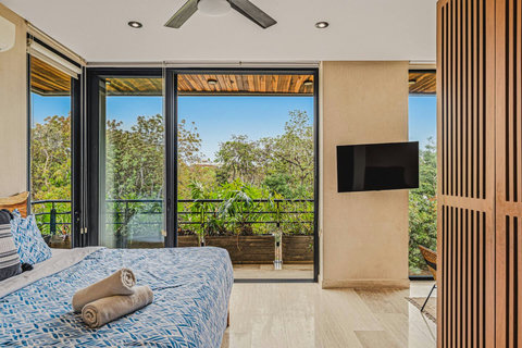 Kingsize Bedroom w Ensuite Bathroom, Private Balcony, Closet, Smart TV, Kitchenette, Mini Bar,Seating Area,Fan and AC
