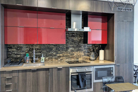 Cook, dine, and create memories in this sleek, modern kitchen.