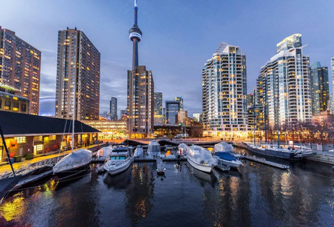 Unwind with a glass of wine and stunning skyline views.