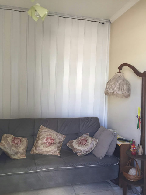 Terceiro quarto com sofá-cama.