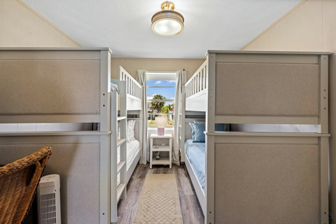 Two twin bunk beds that sleep 4.