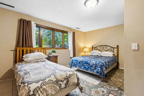 Bedroom #3, 1 Twin, 1 Queen. Lower level.