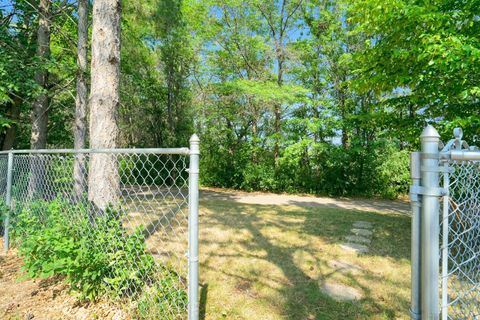 Walking trail around Colby Lake  can be accessed right behind the home.