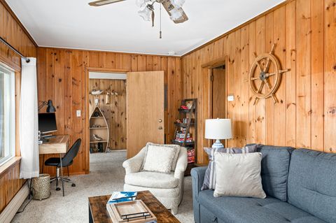 2nd family room with a pullout couch and a  fireplace