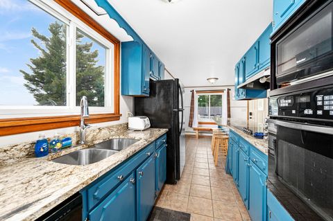 Kitchen with Granite counter tops & Lake View