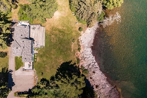 Overhead view from a drone camera. The cabin is only 70 feet from the lake.
