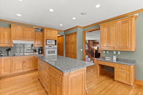 Fully equipped kitchen with pots and pans, dishes, utensil. Granite counter tops