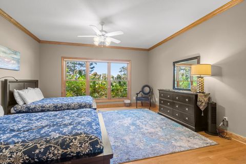 Bedroom 1, 2 doubles, ensuite bathroom, lake view, main floor