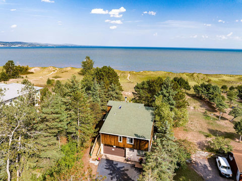 Park Point home, Four bedroom with lake view, direct access to sandy beach,