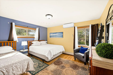 Bedroom 2,  with a queen and single bed, main floor