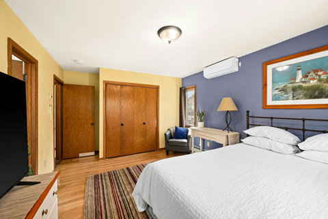 Master bedroom with a 3/4 ensuite bathroom