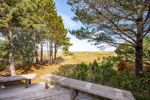 Deck with lots of seating, fire pit to gather around