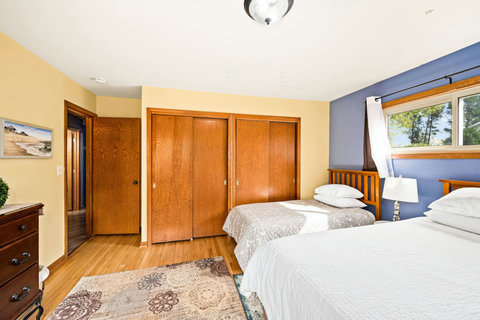 Bedroom 2,  with a queen and single bed, main floor