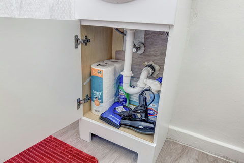 Always stocked with extra toilet paper, cleaning supplies, extra soap, a first-aid kit, and a hairdryer