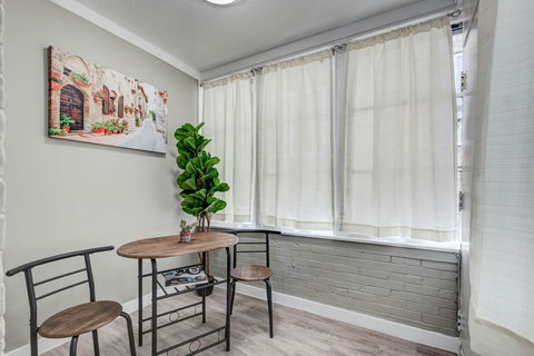 A bistro seating area in the sunroom
