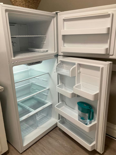 Refrigerator with Brita pitcher and ice tray