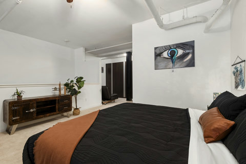Primary bedroom in the loft upstairs