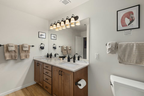 Secondary bathroom attached to downstairs bedroom