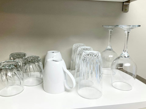 Large and small glassware, wine glasses, coffee mugs